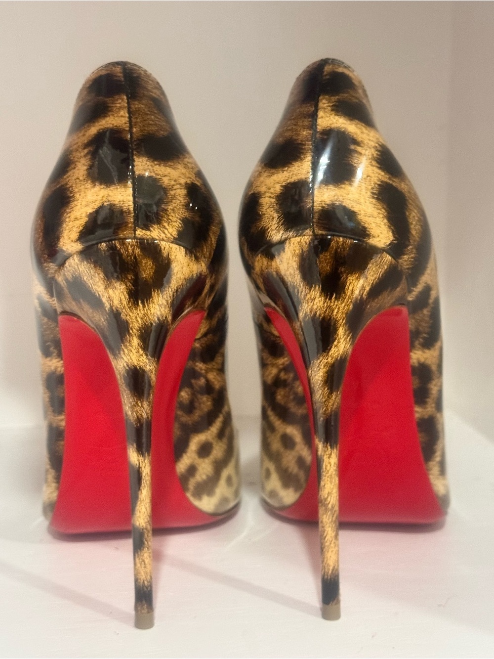 Christian Louboutin Leopard Patent Pumps with Red Soles